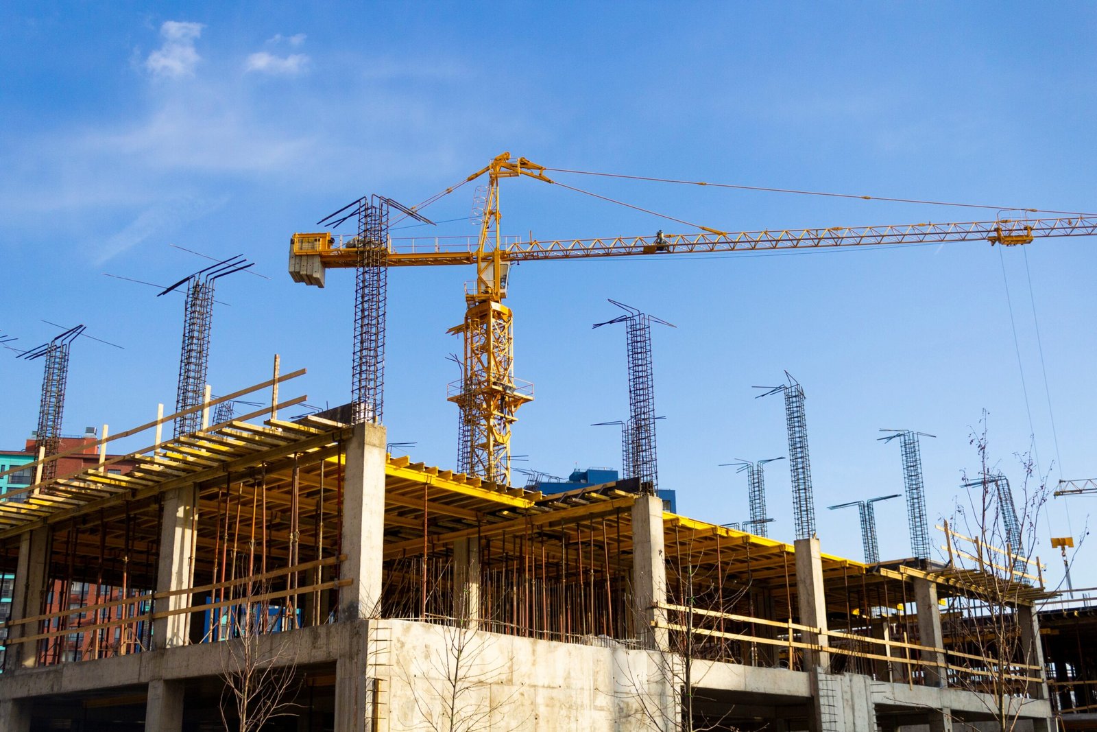crane and building under construction on a sunny d 2026 03 16 02 12 26 utc